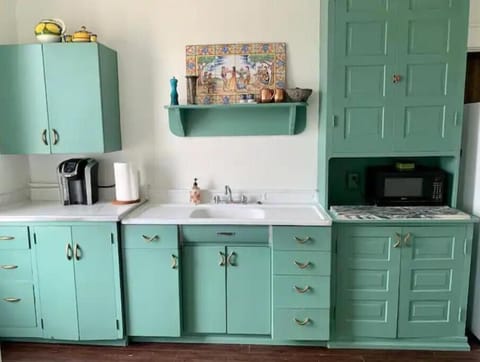 A nice pop of color, Juniper Green, in the Kitchen.