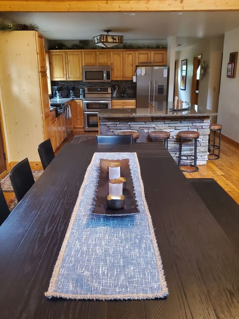 Dining area next to open kitchen