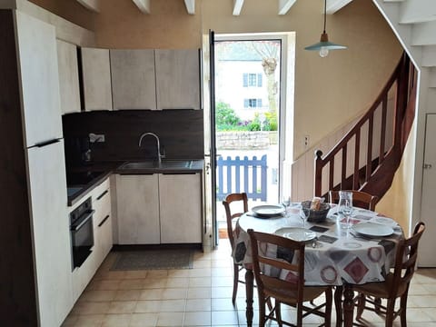 Furniture, Wood, Flooring, Floor, Interior Design, Kitchen, Countertop, Kitchen & Dining Room Table, Chair, Home