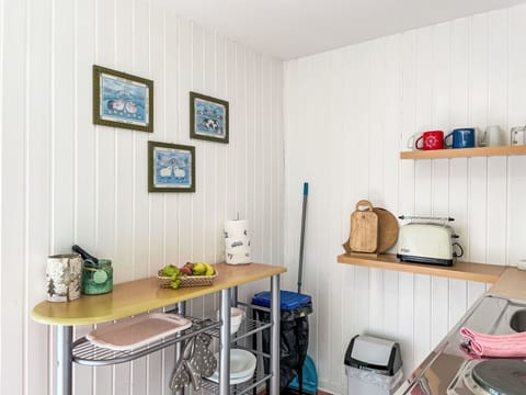 Interior Design, Furniture, Room, Kitchen, Paint, Kitchen Appliance, Shelving, Wood Stain, Countertop