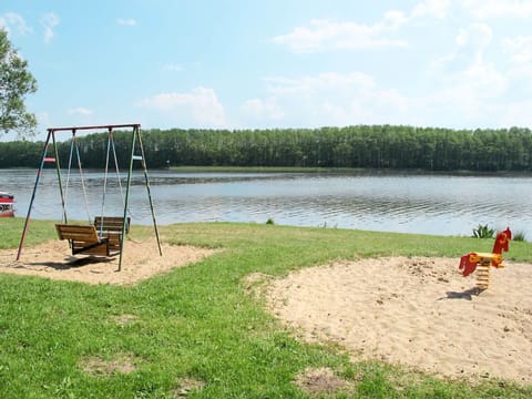 Sky, Property, Plant, Tree, Building, Land Lot, Slope, Shade, Asphalt, Wood