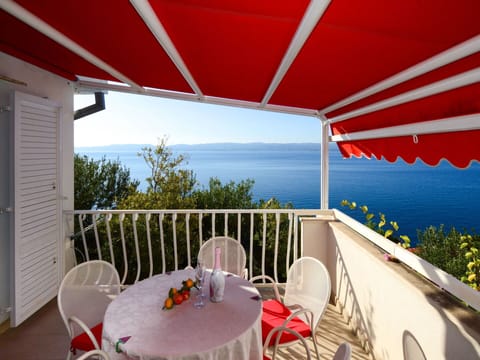 Sky, Furniture, Property, Plant, Table, Chair, Building, Shade, Interior Design, Outdoor Furniture