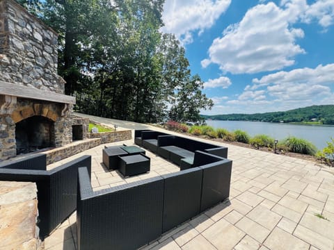 Outdoor Fireplace with cushioned seating