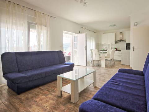 Furniture, Couch, Comfort, Blue, Wood, Interior Design, Table, Floor, Flooring, Living Room