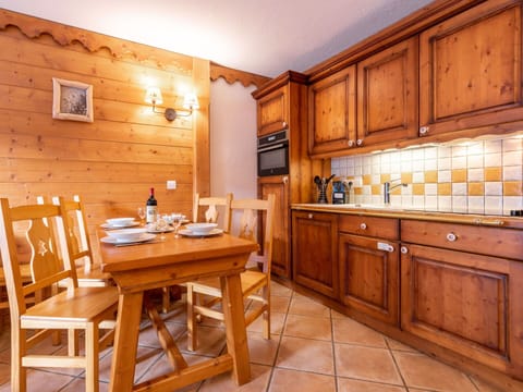 Furniture, Cabinetry, Table, Countertop, Wood, Kitchen, Interior Design, Architecture, Wood Stain, Chair