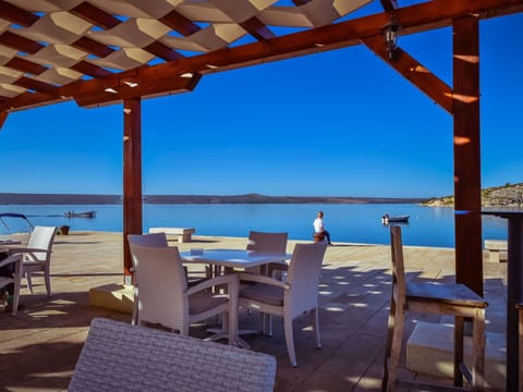 Water, Sky, Table, Furniture, Property, Blue, Azure, Chair, Shade, Wood