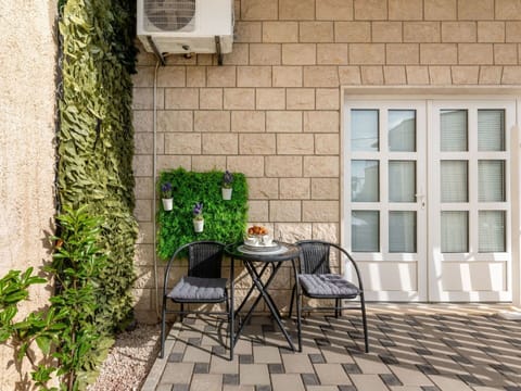 Plant, Furniture, Chair, Building, Window, Brick, Wood, Brickwork, Road Surface, Table