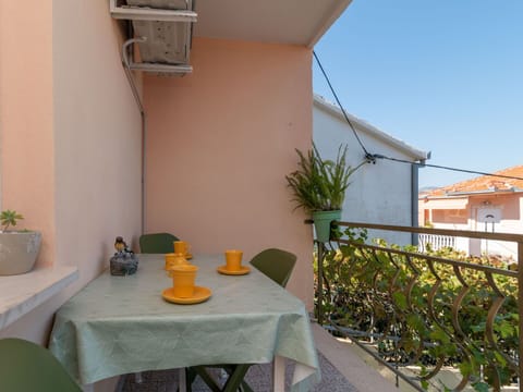 Plant, Table, Property, Furniture, Building, Houseplant, Chair, Flowerpot, Outdoor Table, Outdoor Furniture