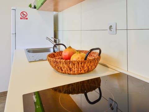 Property, Food, Kitchen, Orange, Cabinetry, Wood, Interior Design, Kitchen Appliance, Floor, Flooring