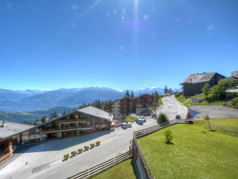 Sky, Plant, Property, Mountain, Building, Cloud, Slope, Tree, Land Lot, Highland