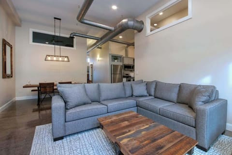 Living room with comfortable sectional sofa and TV