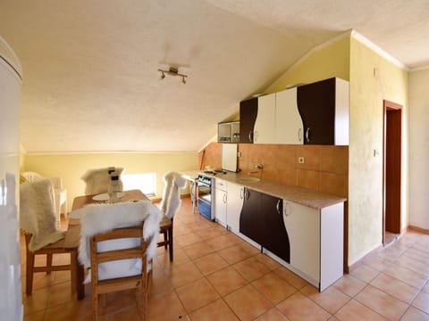 Furniture, Cabinetry, Chair, Building, Wood, Table, Interior Design, Hall, Flooring, Floor