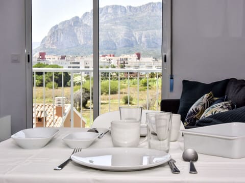 Tableware, Furniture, Property, Window, Table, Dishware, Building, Drinkware, Sky, Couch