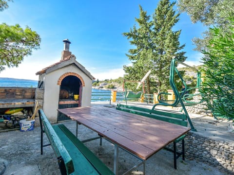 Sky, Plant, Shade, Building, Tree, Water, Wood, Leisure, Cottage, Outdoor Furniture