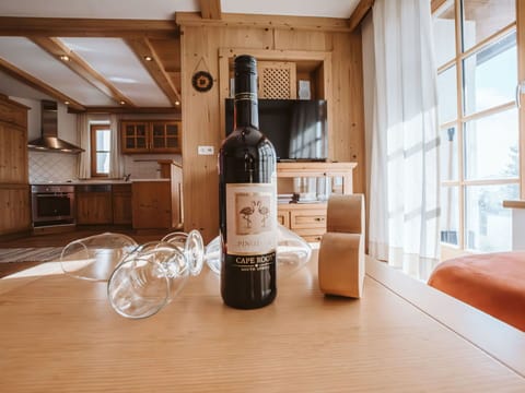 Bottle, Table, Drinkware, Wine, Glass Bottle, Barware, Wood, Building, Interior Design