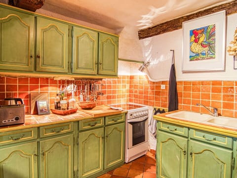 Cabinetry, Countertop, Property, Sink, Kitchen Sink, Kitchen, Kitchen Stove, Interior Design, Wood, Picture Frame