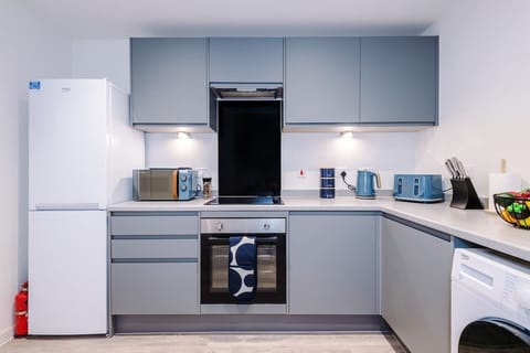 The fully equipped kitchen benefits from all the essentials for a short or long stay in Liverpool.