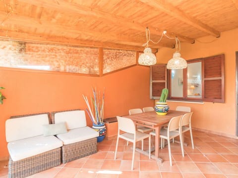 Furniture, Table, Plant, Property, Chair, Wood, Houseplant, Interior Design, Orange, Couch