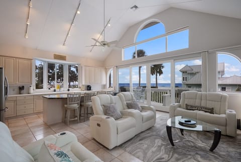 Living Room - Enjoy high ceilings & water views