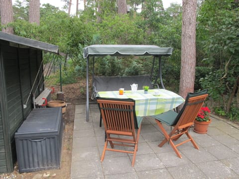 Table, Sky, Furniture, Property, Building, Interior Design, Wood, Shade, Flooring, Chair
