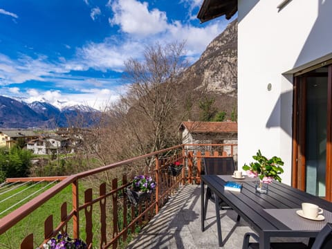 Cloud, Sky, Plant, Building, Table, Mountain, Azure, Flowerpot, Wood, Window