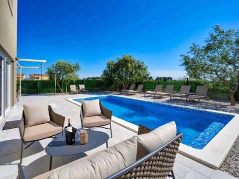 Furniture, Interior Design, Flooring, Floor, Couch, Wood, Wood Flooring, Living Room, Ceiling, Room