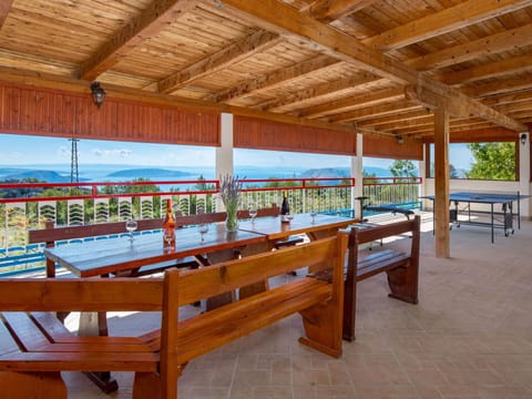 Furniture, Table, Wood, Outdoor Furniture, Shade, Floor, Flooring, Swimming Pool, Hardwood, Bench