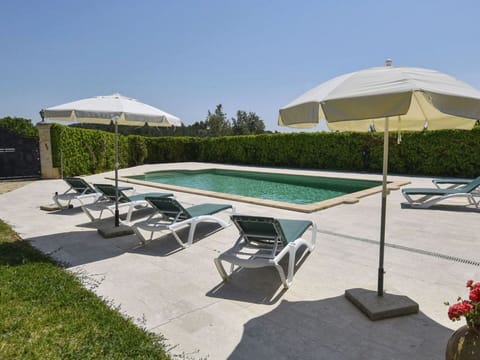 Water, Sky, Property, Swimming Pool, Azure, Cloud, Seaside Resort, Outdoor Furniture, Plant, Tree