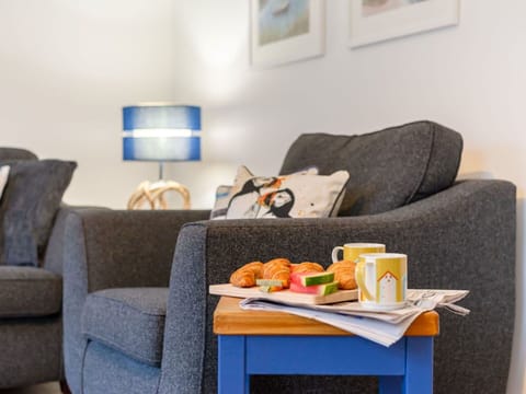 Couch, Furniture, Property, Table, Comfort, Picture Frame, Interior Design, Orange, Food, Studio Couch
