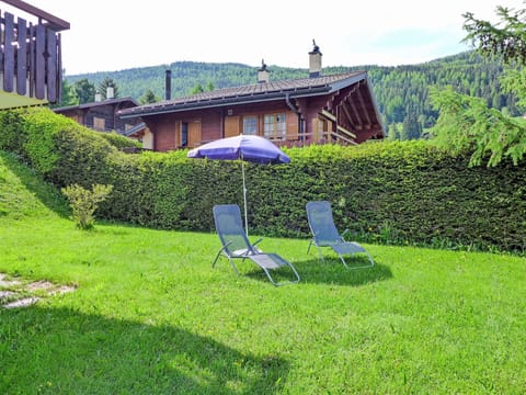 Plant, Property, Sky, Plant Community, Building, Natural Landscape, Tree, Outdoor Furniture, Chair, Land Lot