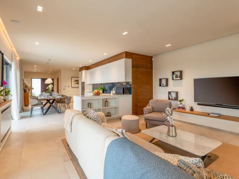 Furniture, Interior Design, Flooring, Couch, Floor, Living Room, Wood, Ceiling, Table, Room