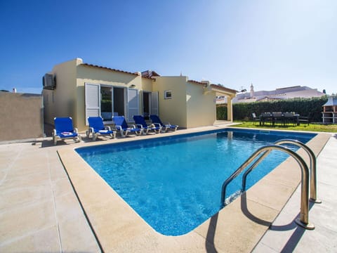 Water, Sky, Swimming Pool, Plant, Window, Building, Shade, Rectangle, Outdoor Furniture, Chair