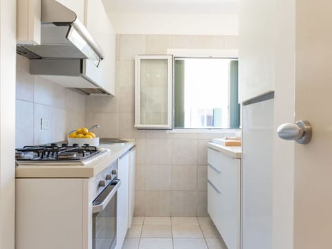 Building, Cabinetry, Window, Kitchen Stove, Kitchen Appliance, Interior Design, Kitchen, Cooktop, Floor