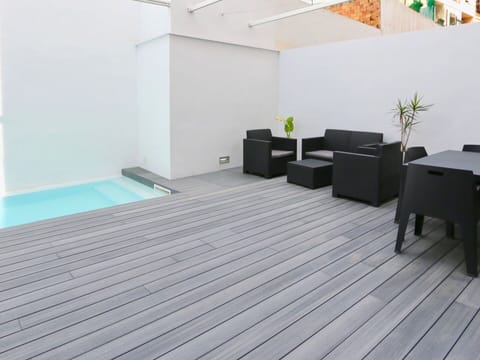 Building, Wood, Flooring, Floor, Urban Design, Houseplant, Plant, Table, Swimming Pool