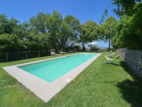 Plant, Sky, Swimming Pool, Water, Tree, Shade, Land Lot, Rectangle, Grass, Flooring