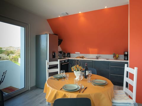 Table, Property, Furniture, Chair, Cabinetry, Interior Design, Tableware, Orange, Countertop, Wood