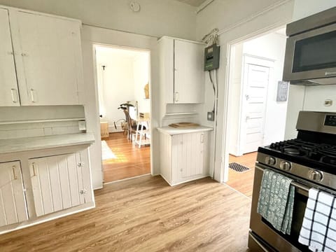 Kitchen leads to Living room