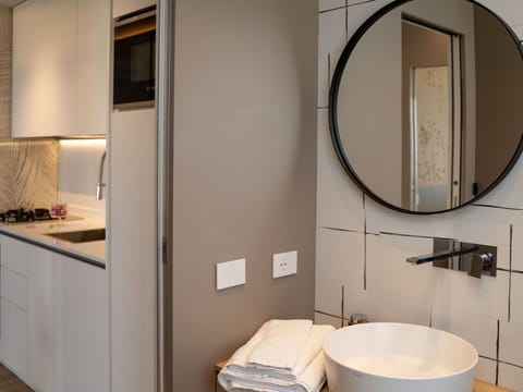 Mirror, Sink, Interior Design, Wood, Plumbing Fixture, Cabinetry, Bathroom Sink, Tap, Bathroom