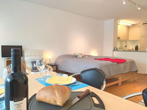 Table, Property, Furniture, Building, Comfort, Bottle, Interior Design, Wood, Wine, Bed Frame