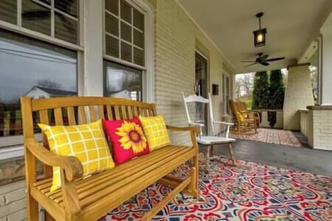 Relax and enjoy the large front porch. (1)
