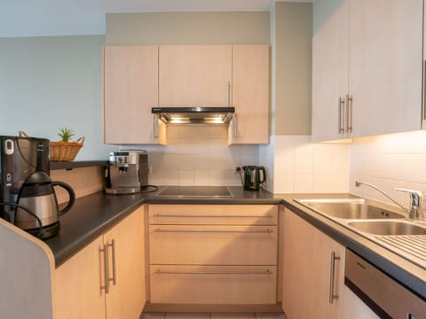 Cabinetry, Kitchen Sink, Countertop, Property, Sink, Kitchen Appliance, Kitchen, Kitchen Stove, Home Appliance, Wood