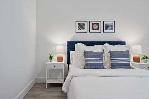 Guest bedroom with comfortable queen size bed and high quality bed sheets
