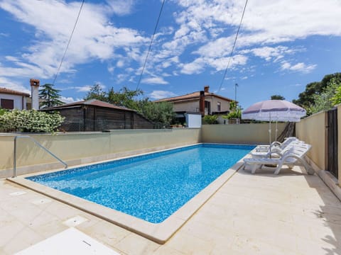 Water, Cloud, Sky, Property, Swimming Pool, Plant, Azure, Building, Shade, Composite Material