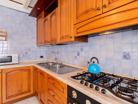 Plant, Sky, Building, Window, Tree, Urban Design, Body Of Water, Condominium, Arecales, Cloud