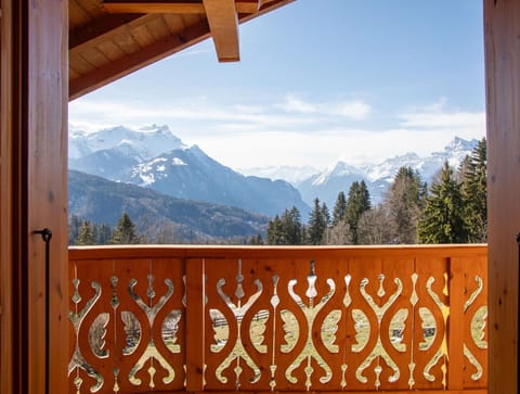 Sky, Cloud, Property, Mountain, Wood, Tree, Fence, Architecture, Biome, Mountainous Landforms