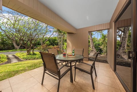 Enjoy your morning coffee surrounded by lush greenery on this private lanai