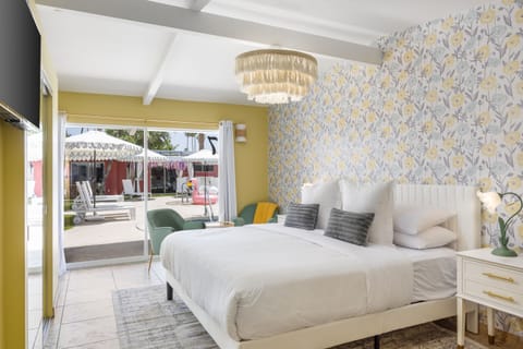 Wake up to sunshine, lush floral vibes, and a sparkling pool view right from your bed!