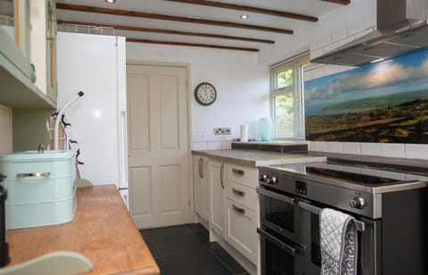 Kitchen with electric range cooker