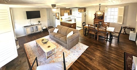 Pull out queen sofa bed to comfortably fit 6 people total.