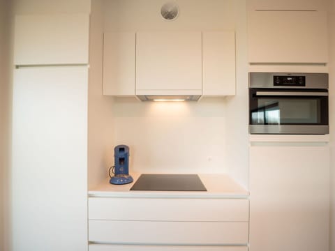 Cabinetry, Property, Kitchen Appliance, Countertop, Home Appliance, Kitchen, Interior Design, Wood, Shelving, Kitchen Stove